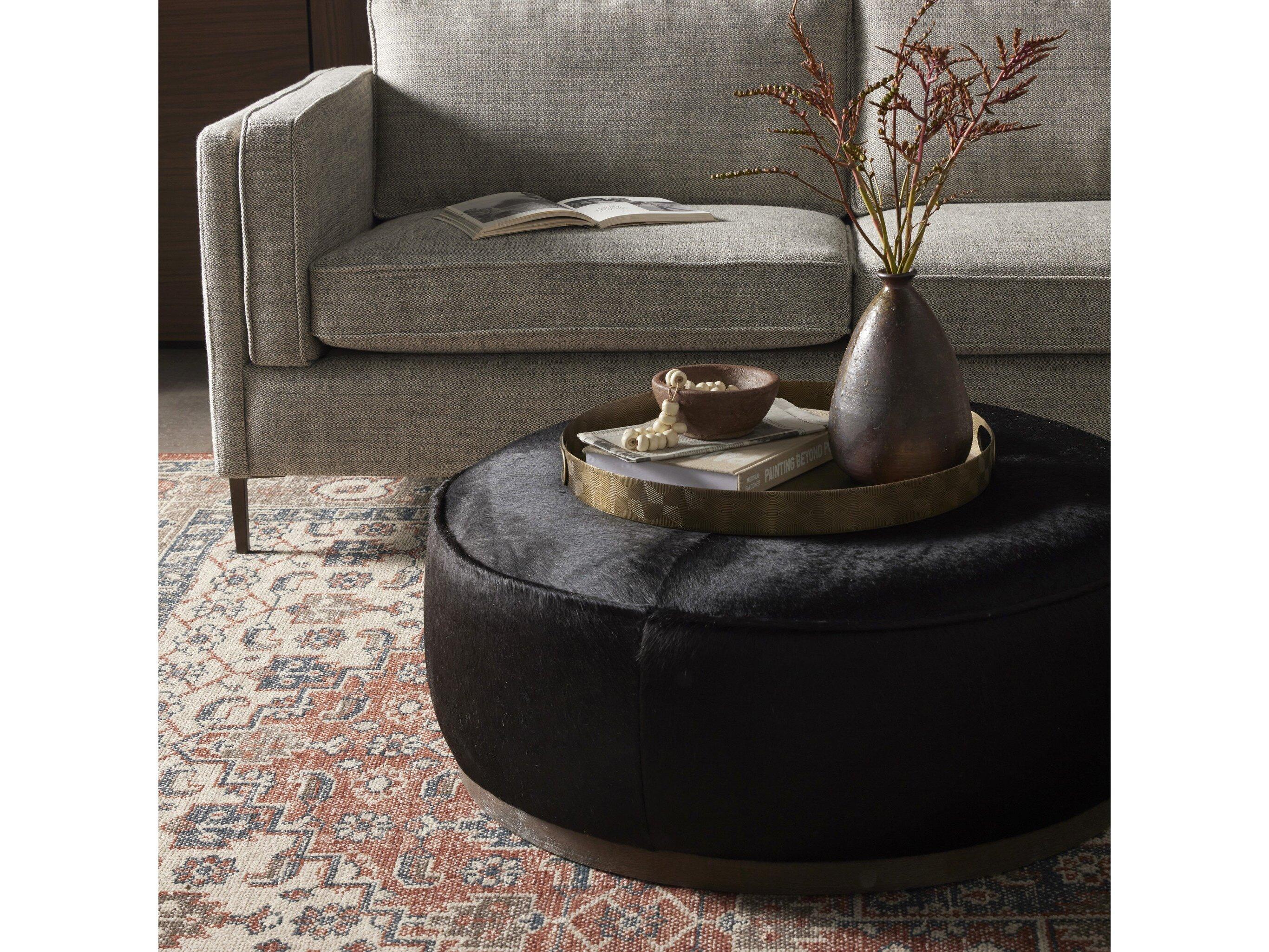 Four Hands Westgate Sinclair Dark Hair on Hide Leather Large Round Ottoman