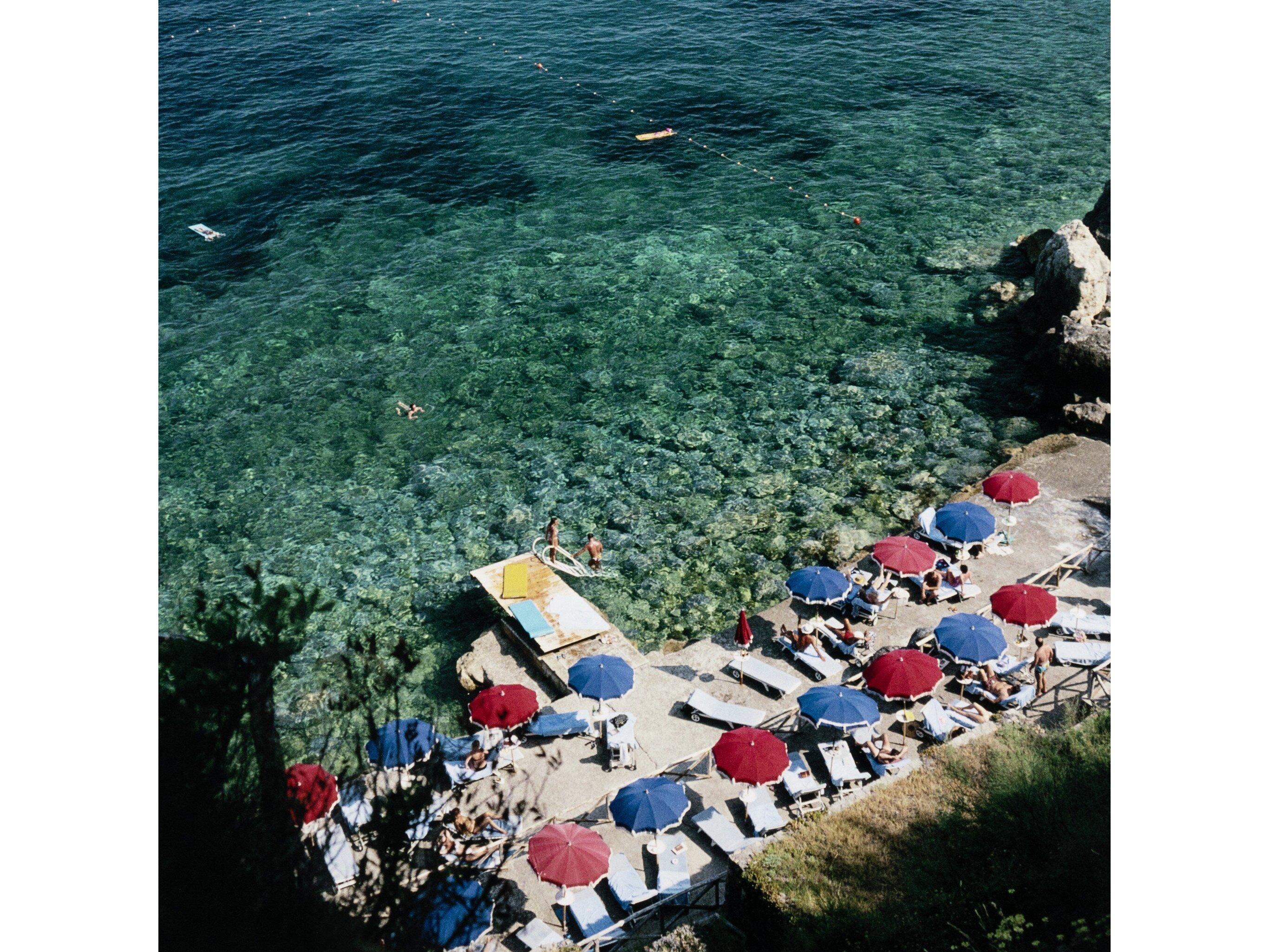 Four Hands Art Studio Porto Ercole Beach by Slim Aarons White Maple Floater  Canvas Wall Art