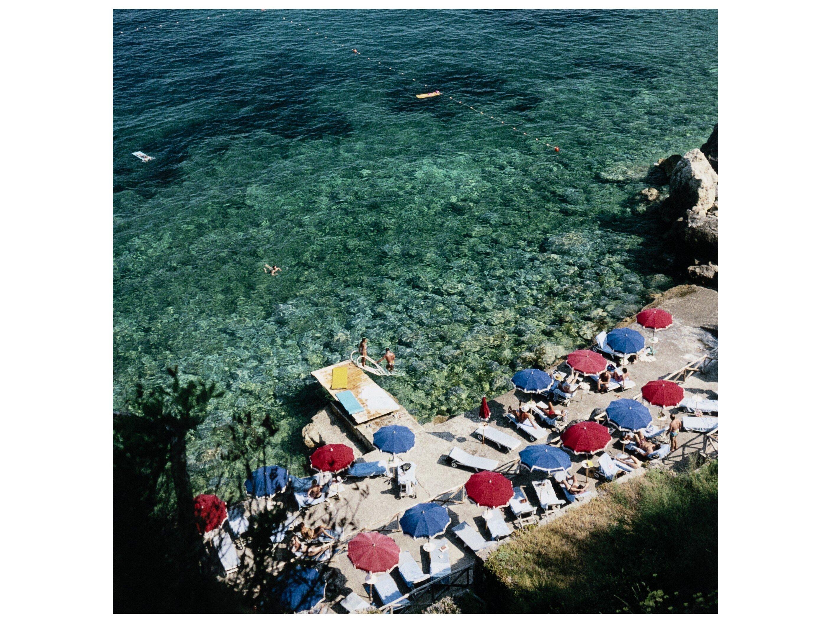 Four Hands Art Studio Porto Ercole Beach by Slim Aarons White Maple Floater  Canvas Wall Art