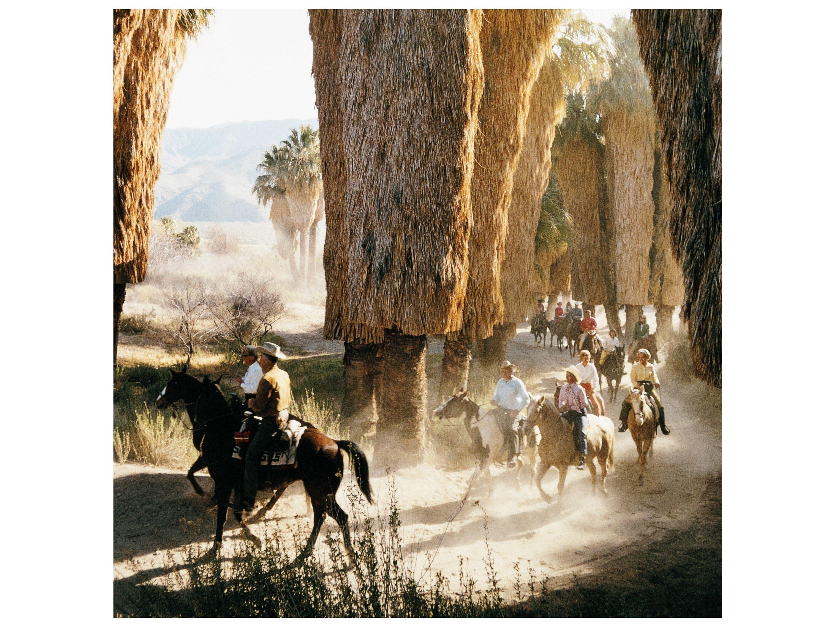Four Hands Art Studio Palm Springs Riders by Slim Aarons Vertical Grain White Oak Floater  Canvas Wall Art