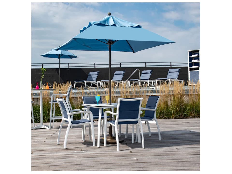 Grosfillex Sunset Sling Aluminum Glacier White Comfort Stacking Outdoor Dining Arm Chair in Madras Blue