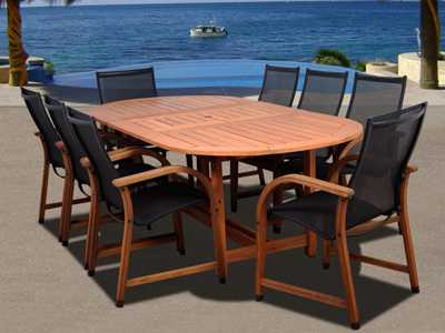 International Home Miami Amazonia Eucalyptus Oval Nine Piece Extendable Bahamas Outdoor Dining Set
