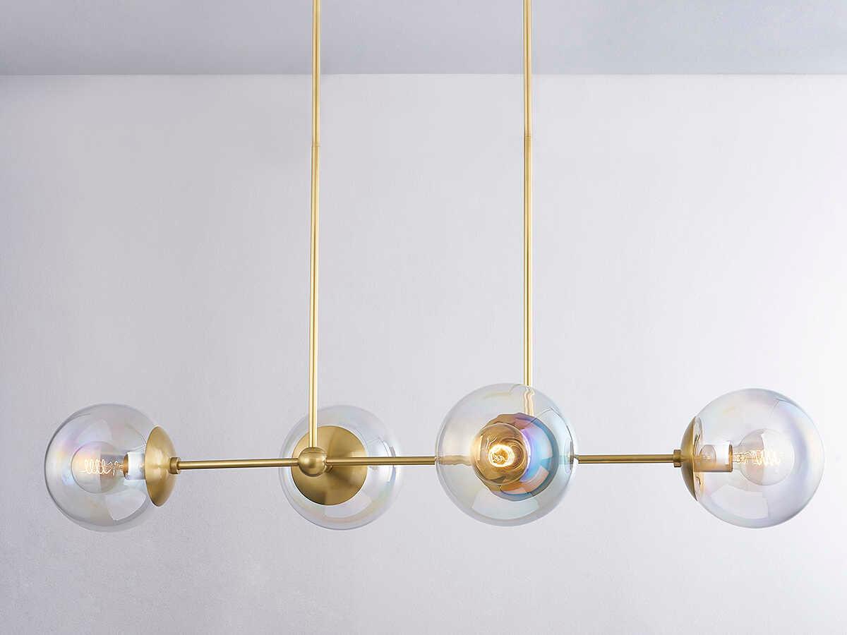 Mitzi Ophelia 4-Light Aged Brass Glass Globe Linear Island Pendant
