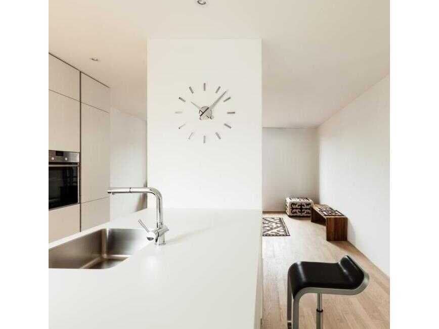 Nomon Puntos Chrome Steel Wall Clock