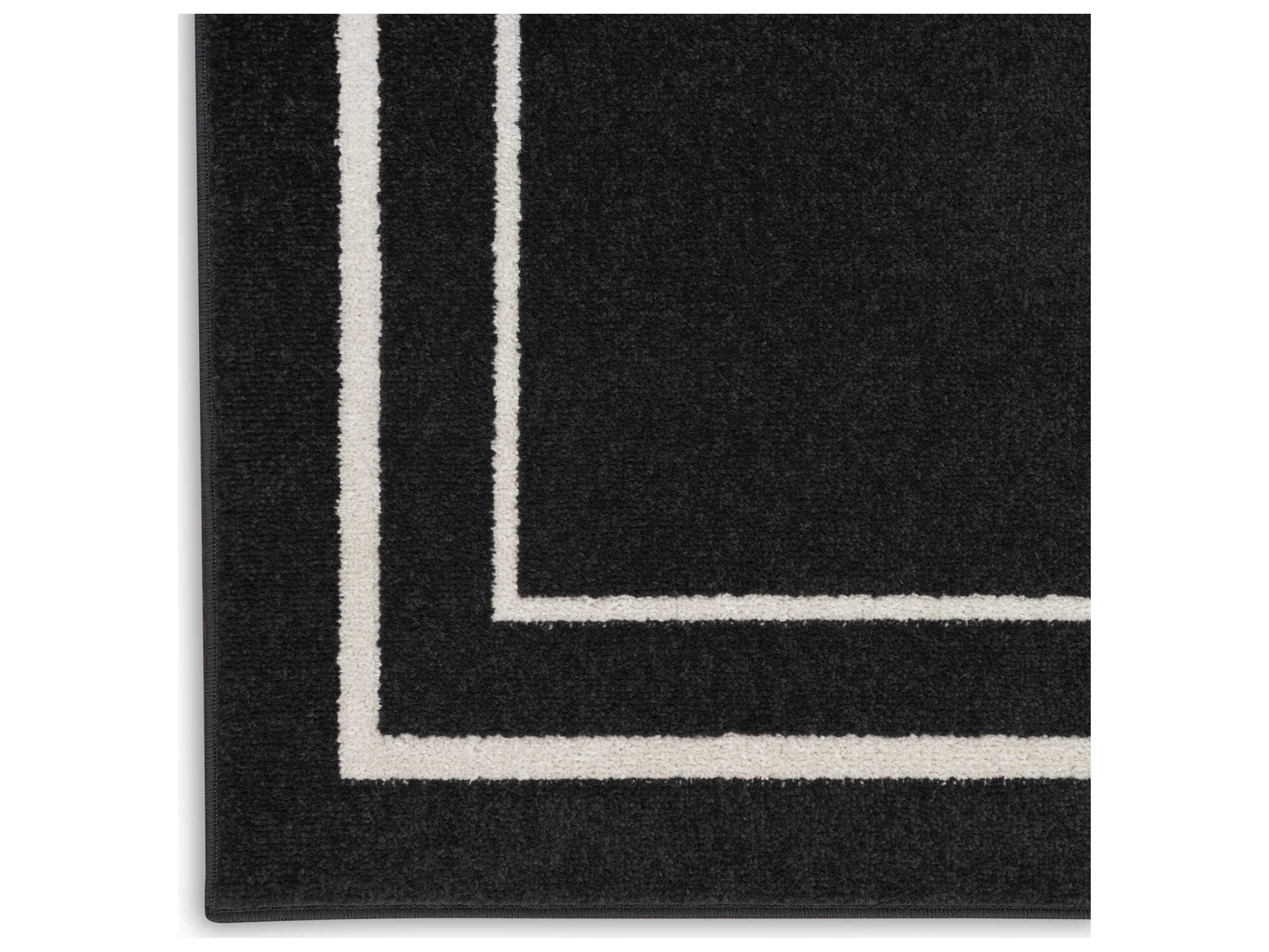 Nourison Essentials Bordered Area Rug