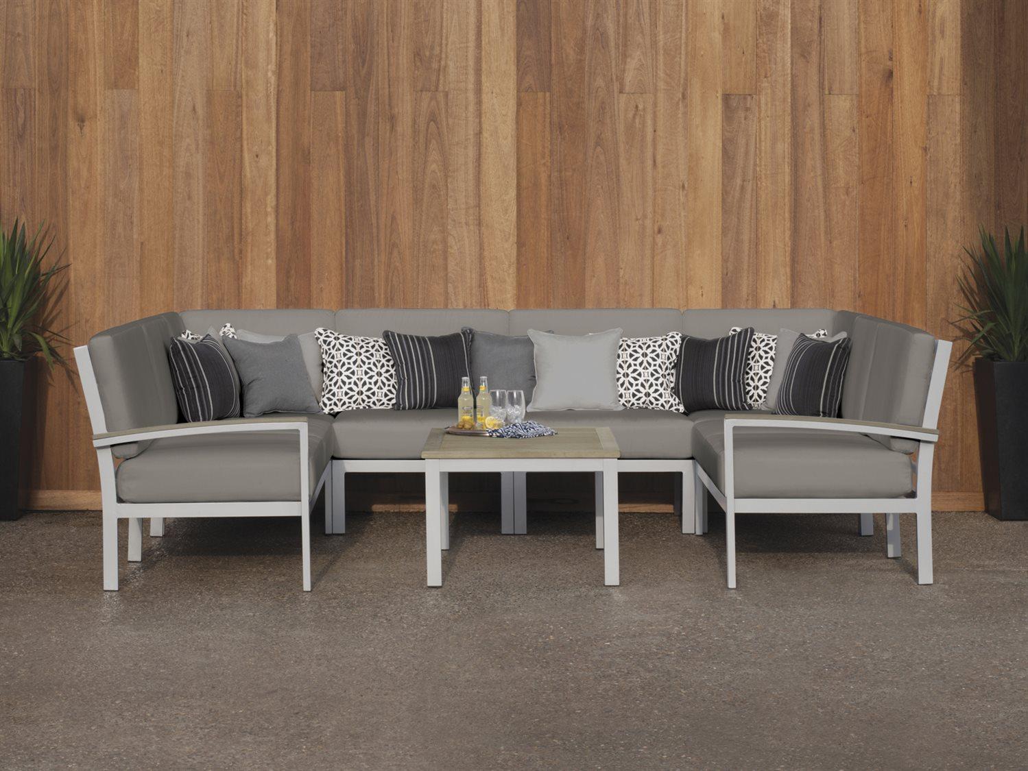 Oxford Garden Travira 7 Piece Modular Aluminum Cushion Lounge Sectional and Table Set