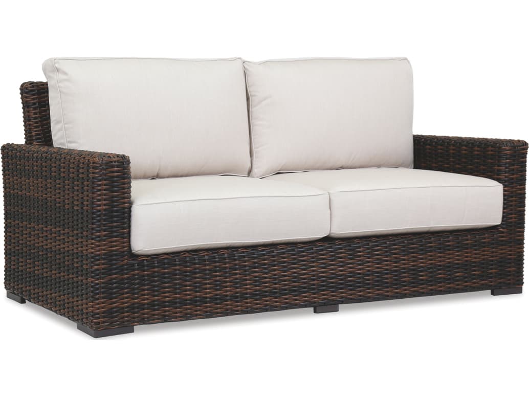 Sunset West Montecito Wicker Outdoor Loveseat in Canvas Flax with Self Welt