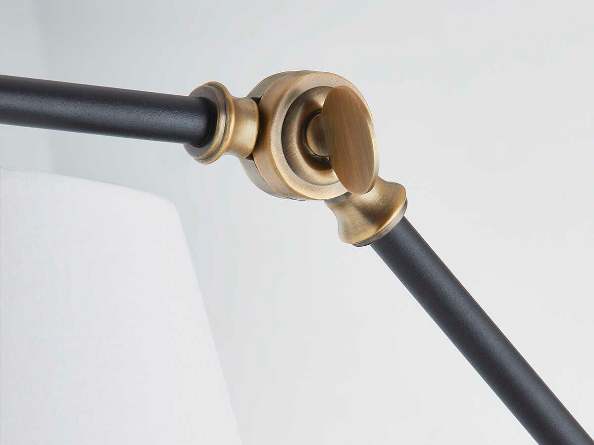 Troy Lighting Navin 1-Light Patina Brass Black Swing Wall Sconce