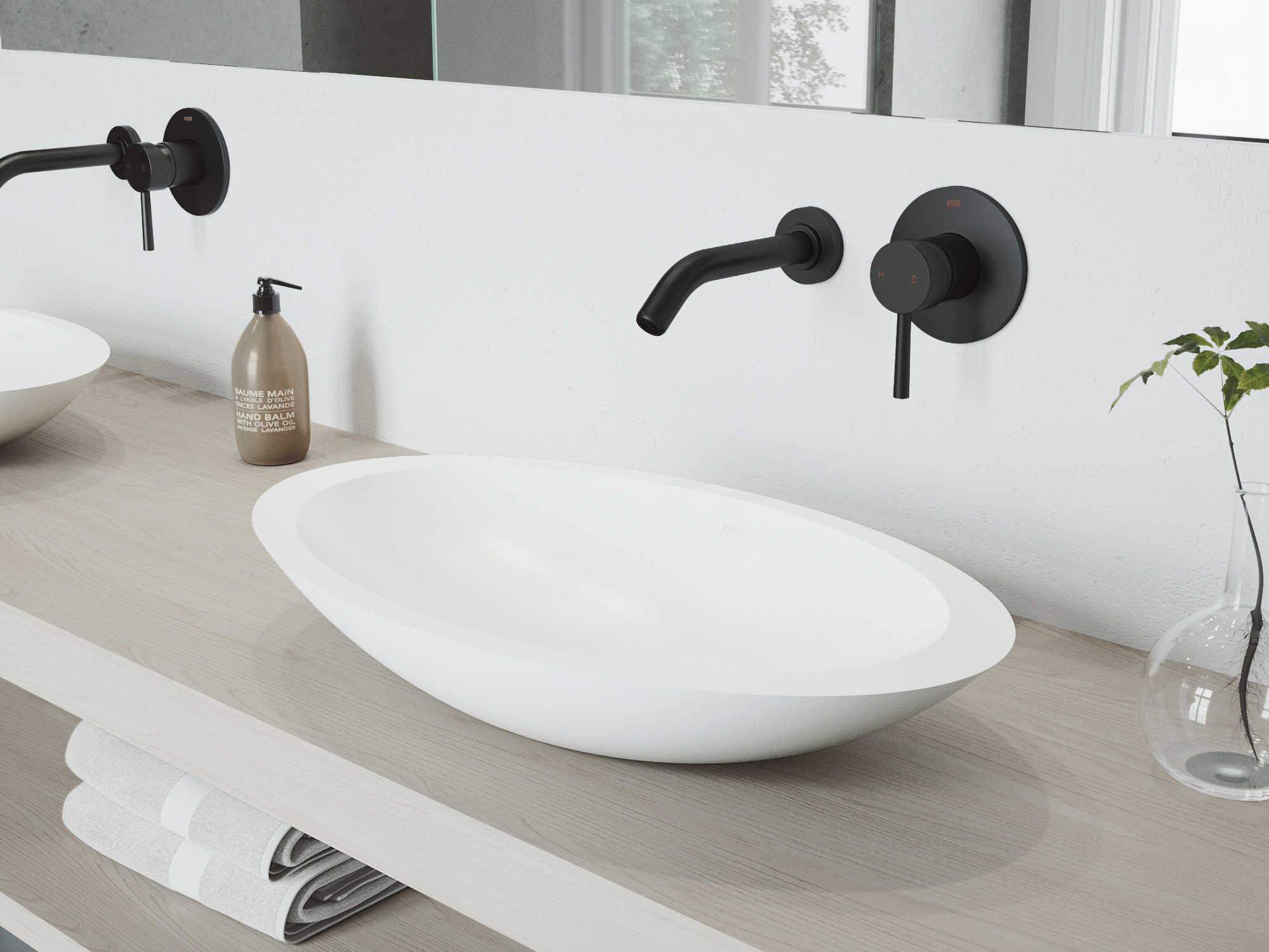 Vigo Wisteria Matte White 23" Oval Vessel Bathroom Sink with Matte Black Single-Lever Olus Wall-Mount Faucet and Drain