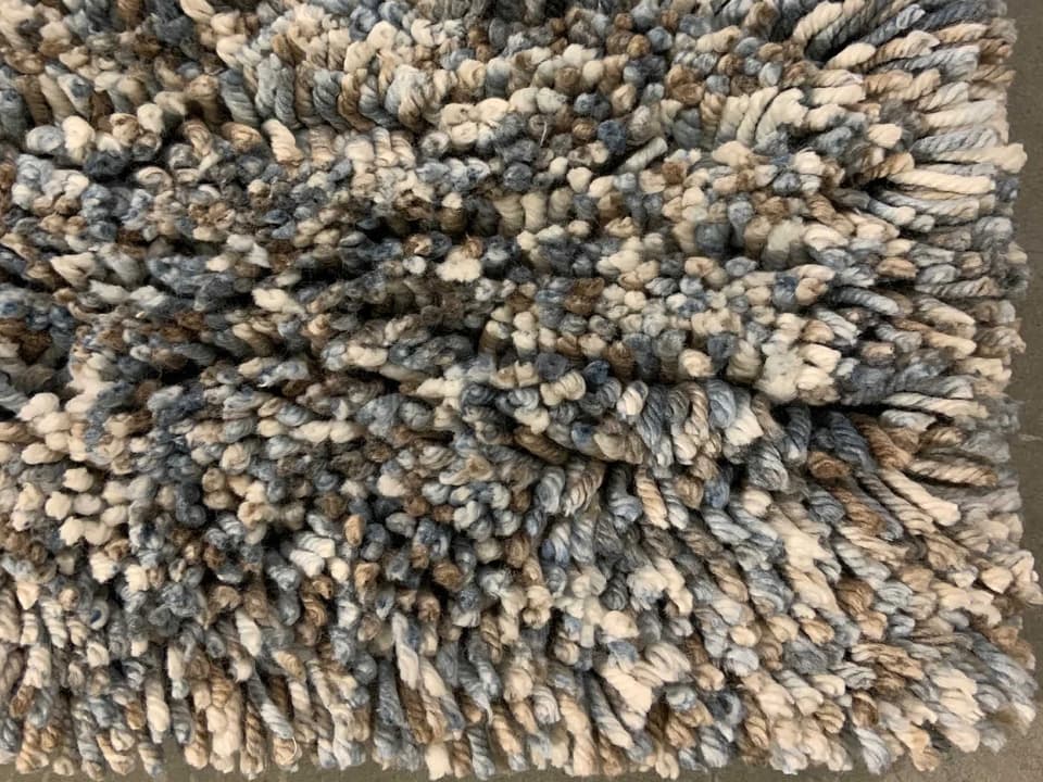 Edna Hand-Woven Polyester Shag Area Rug in Blue Brown White