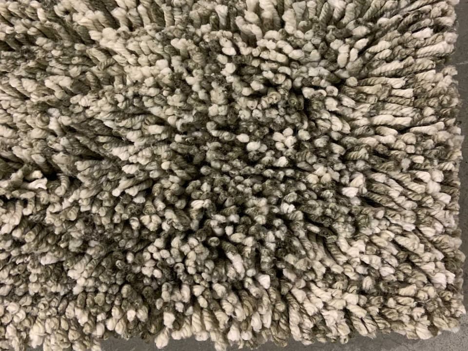 Edna Hand-Woven Wool and Polyester Shag Abstract Area Rug