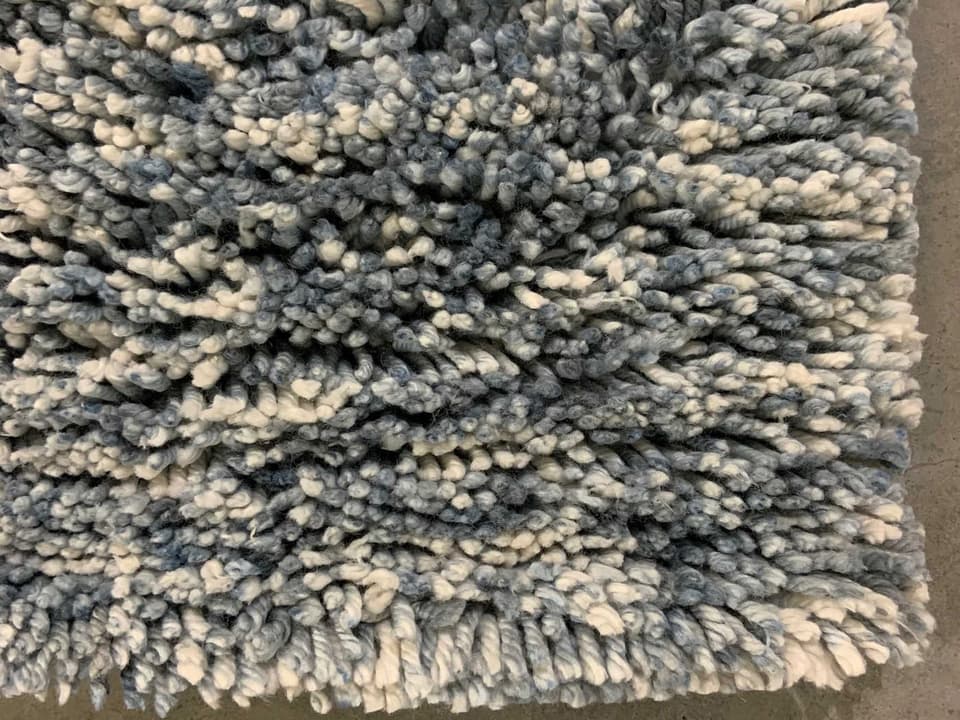 Edna Hand-Woven Shag Abstract Area Rug