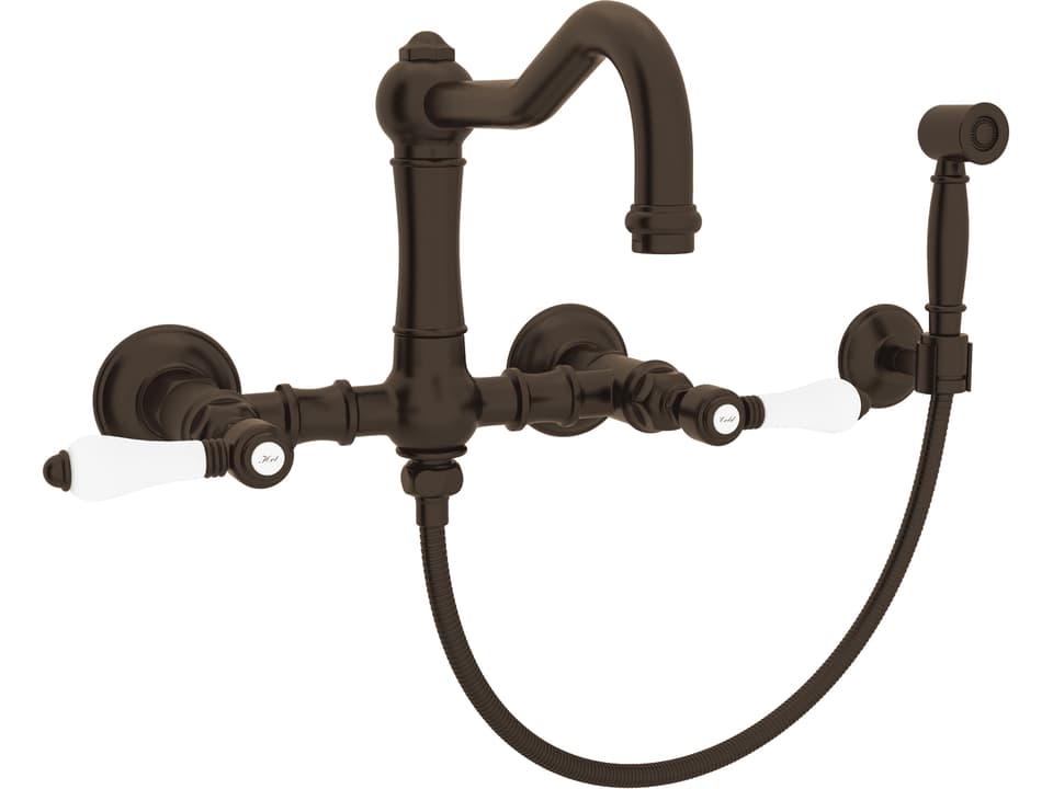 Acqui Wall Mounted Bridge Kitchen Faucet with Sidespray and Porcelain Levers in Tuscan Brass