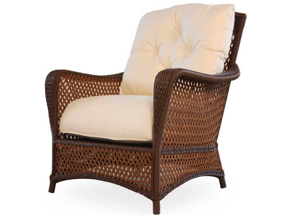 Grand Traverse Outdoor Lounge Chair with Cushions in Caramel Wicker