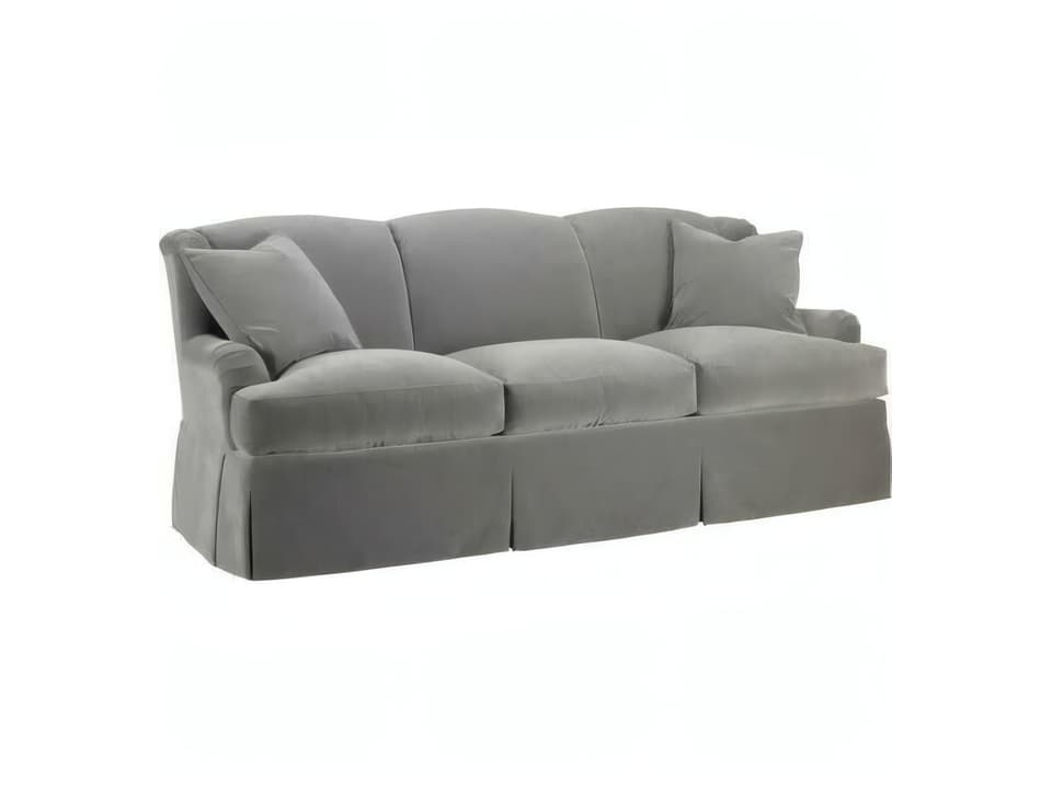 Winged Upholstered Sofa with Dressmaker Skirt