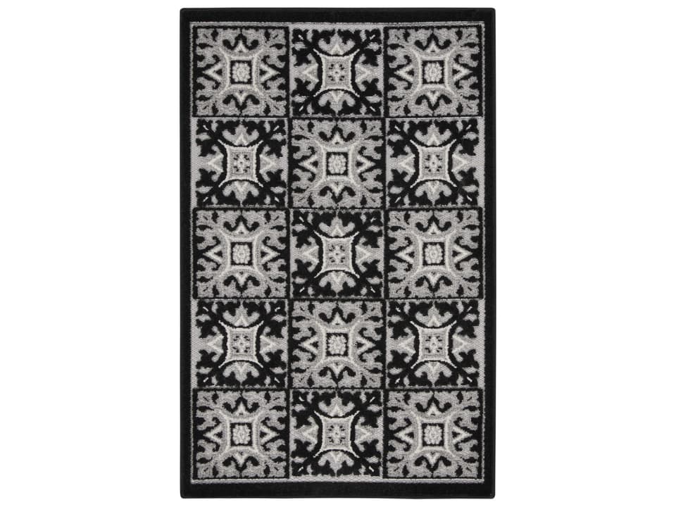Aloha Geometric Indoor Outdoor Area Rug in Black White