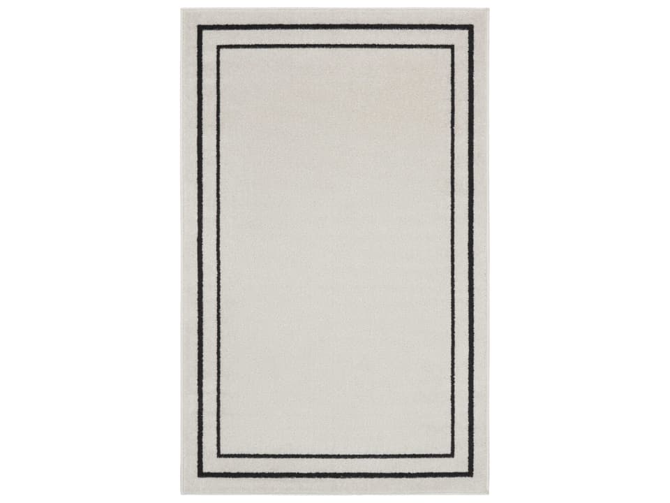 Essentials Bordered Indoor Outdoor Area Rug in Ivory and Black