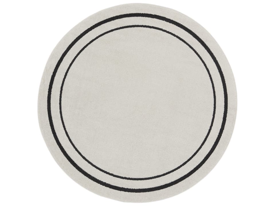 Essentials 4-Foot Round Polypropylene Indoor Outdoor Area Rug in Ivory Black