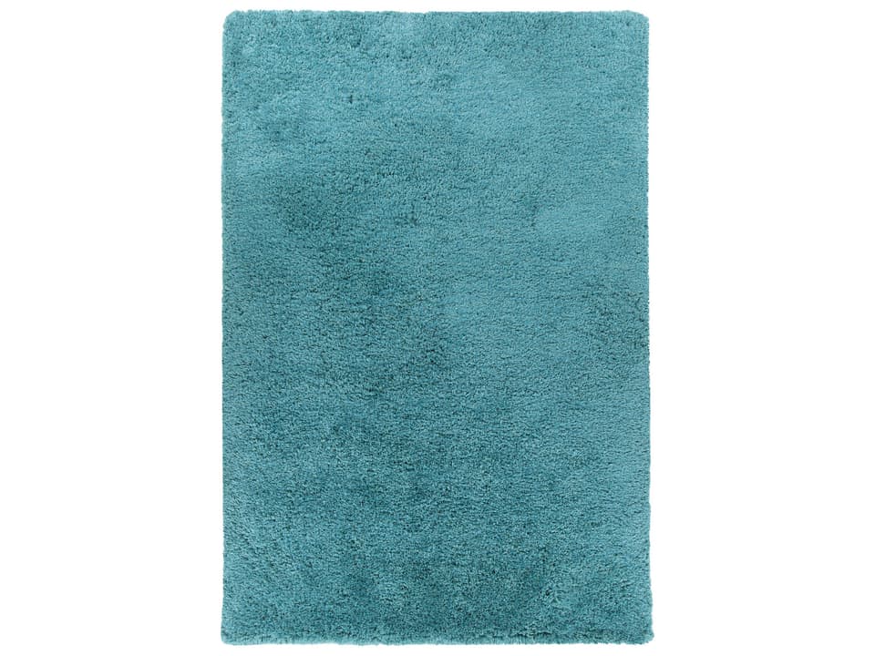 Osim Hand-Woven Shag Area Rug in White