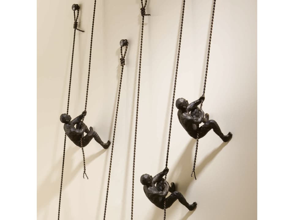 Climbing Man Wall Sculpture in Bronze Cast Iron