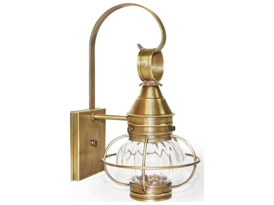 Caged Onion Outdoor Wall Sconce in Antique Brass with Optic Glass